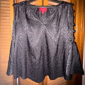 Jennifer Lopez leopard top.